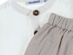 Immagine di Noukie's completo camicia+pantaloni bianco-beige tg 9 mesi