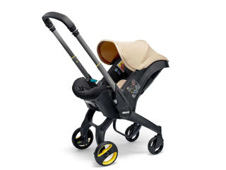 Visualizza i dettagli per Doona I i-Size seggiolino auto e passeggino sahara sand - Seggiolini per neonati Immagine di Doona I i-Size seggiolino auto e passeggino sahara sand - Seggiolini per neonati